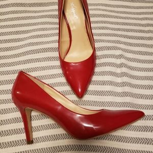 Red patent leather pumps